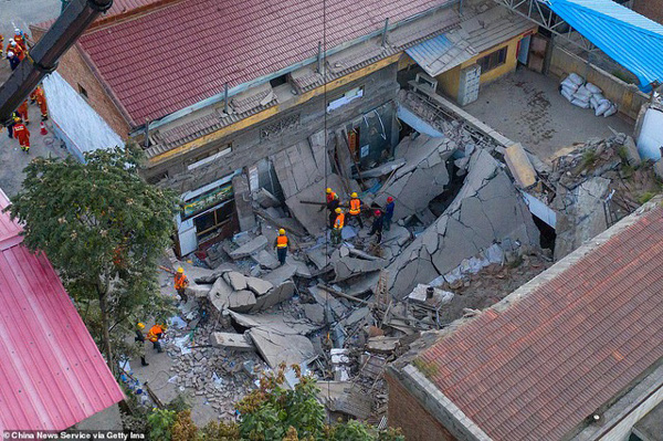 Cận cảnh hiện trường vụ sập nhà hàng ở Trung Quốc khiến ít nhất 29 người chết - Ảnh 7.