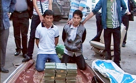 Quảng Ninh: Bắt 60 b&aacute;nh heroin trung chuyển qua Việt Nam 1