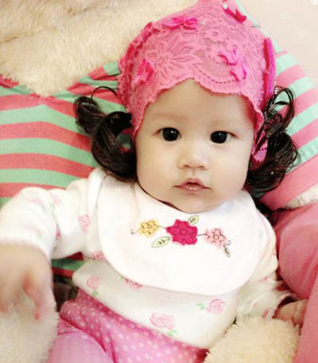 Vẻ đẹp lạ của các em bé con lai nhà sao Việt 7