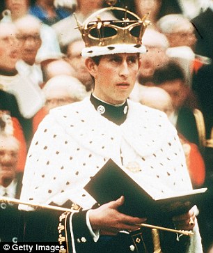 Crowned: Prince Charles looks overawed at his investiture, but he carried it off well with encouragement from the queen