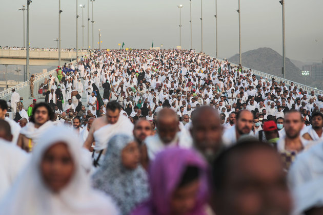 Hundreds of thousands of Muslim pilgrims make their way to cast stones at a pillar symbolizing the stoning of Satan, in a ritual called Jamarat, the last rite of the annual hajj, on the first day of Eid al-Adha, in Mina near the holy city of Mecca, Saudi Arabia,