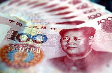 Nh&acirc;n d&acirc;n tệ của Trung Quốc ch&iacute;nh thức trở th&agrave;nh đồng tiền quốc tế. Ảnh minh họa: AP