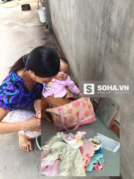
B&eacute; g&aacute;i hơn 3 th&aacute;ng tuổi đang được chị Mai chăm s&oacute;c (Ảnh: Ho&agrave;ng Long)
