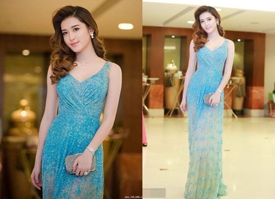 Lột xác với hình ảnh sang trọng và vô cùng sexy, Huyền My dường như trưởng thành hơn rất nhiều. Diện cùng một thiết kế với hoa hậu Đặng Thu Thảo nhưng Huyền My không bị trở nên nhàm chán và mờ nhạt. Ngược lại, cô biết cách làm mới mình với những phụ kiện đi kèm tinh tế như bộ đôi dây chuyền, bông tai nhỏ nhắn cùng chiếc ví lấp lánh tôn lên vẻ quý phái.