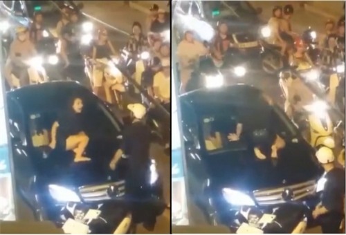 Cô gái trẻ xinh như hot girl nhảy lên capo xe Mercedes đánh ghen gây náo loạn Hà Nội Ảnh: Cắt từ video