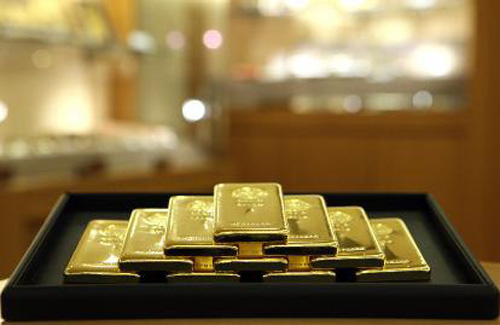 
Mỗi ounce v&agrave;ng&nbsp;giảm gi&aacute; sau một tuần tăng mạnh. Ảnh:&nbsp;Bloomberg.

