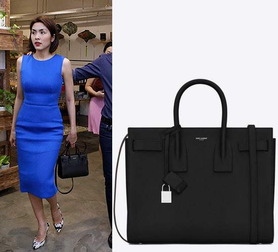 C&ocirc; to&aacute;t l&ecirc;n diện mạo thanh lịch trong chiếc v&aacute;y xanh liền th&acirc;n phối với&nbsp;t&uacute;i đen hiệu Saint Laurent Sac De Jour. T&uacute;i c&oacute; gi&aacute; khoảng 60 triệu đồng.