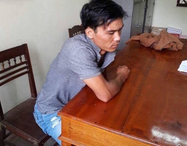 Đối tượng Nguyễn Cao Thắng tại cơ quan điều tra (ảnh Hồ Thắng)
