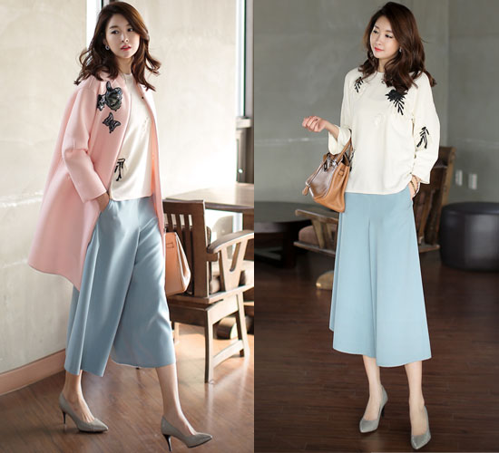 Quần ống rộng hay còn gọi là quần culottes là dáng quần được tín đồ thời trang hiện đại yêu thích nhiều trong năm qua. Đặc biệt dáng quần sành điệu này mang đến cho công sở hiện đại phong cách khá trẻ trung, mới lạ.