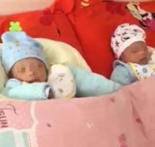 
Hai con trai của Shao đang nằm trong khoa chăm sóc đặc biệt vì các bé bị nhiễm trùng do sinh non. Ảnh: zjol.com.cn
