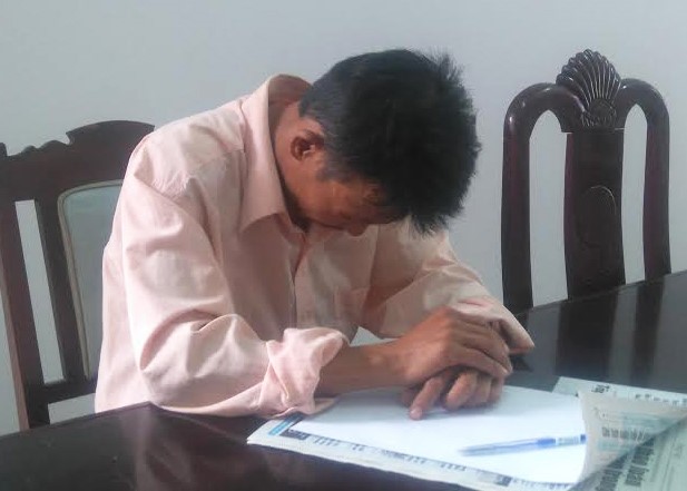 Anh Nguyễn Đình Quang tại cơ quan công an. Ảnh: Nguyên Vũ.