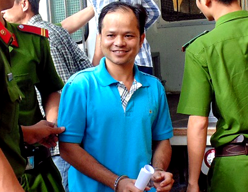 
Võ Văn Minh được dẫn đến tòa (ảnh tư liệu)
