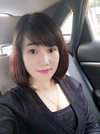 Nguyễn Thị Lam trước l&uacute;c tới cơ quan c&ocirc;ng an đầu th&uacute;.