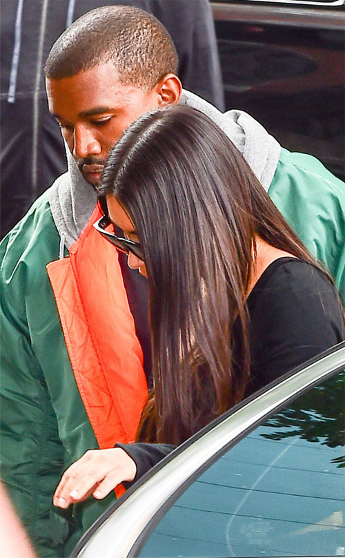 Kanye hộ tống vợ về căn hộ ở New York vào sáng 3/10.