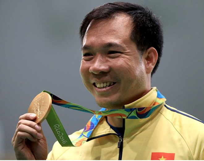 Hoàng xuân Vinh giành HCV Olympic nội dung 10 m ngắn nam. Ảnh: Getty Images.