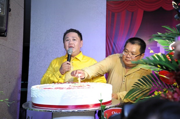 
Anh trai và Minh Béo trong tiệc sinh nhật - Ảnh: Lê Công Sơn
