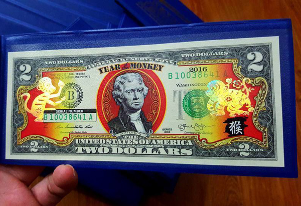 
Tờ 2 USD có in hình khỉ mạ vàng được rao bán với giá 450.000 đồng. Ảnh: T.Trang
