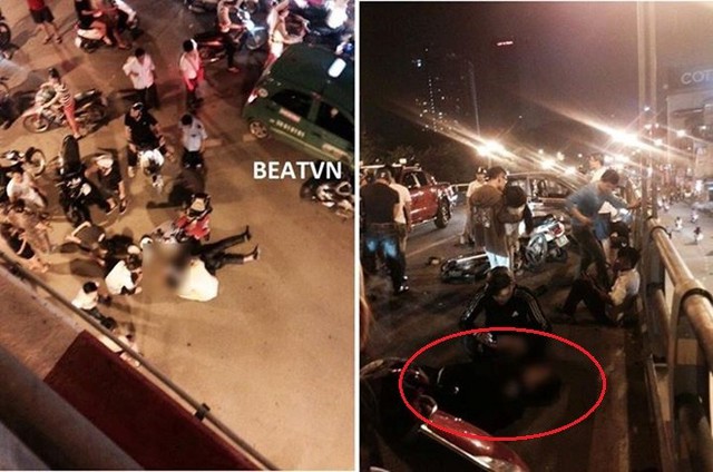 Anh Lê Văn Trường (vòng tròn đỏ) bị hất văng giữa cầu vượt Thái Hà sau quãng đường hàng km trên nắp capo taxi. Ảnh: Beat.vn.