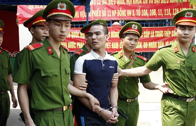 Bị c&aacute;o Đinh Văn Trường tại t&ograve;a - Ảnh: Xu&acirc;n An