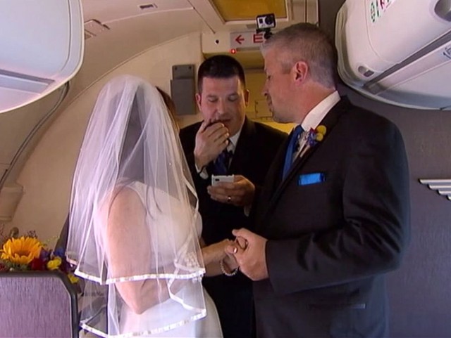 Dottie Coven and Keith Stewart are married on a Southwest Airlines flight, Nov. 2, 2014.