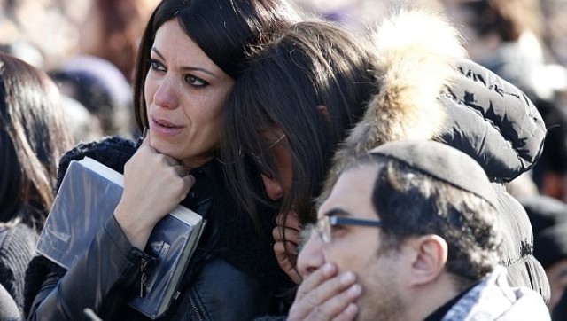 Mourners at the funeral of four Jews killed in an Islamist attack on a kosher supermarket in Paris last week