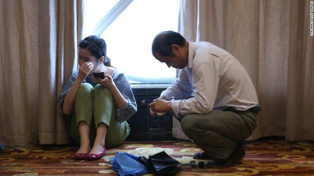 Relatives of passengers wait for information at a hotel in Nanjing, China, on June 2.