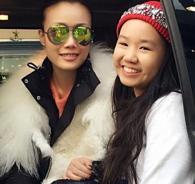 Kind and cheerful: London law student Vivian Chan Wing-Yan (right) has been named among the victims killed in the Bangkok bombing. She is pictured with her favourite Canto-pop singer Joey Yung who paid a heartfelt tribute to the 19-year-old saying: Thank you for being in my life