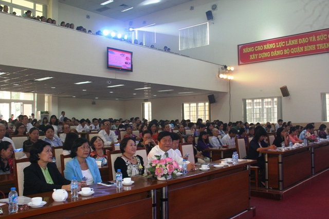 Đại biểu tham dự lễ mít tinh 55 năm kỷ niệm Ngày Dân số Việt Nam (26/12).