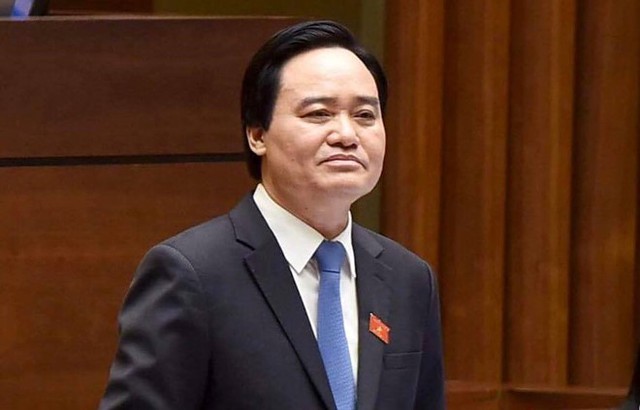 Bộ trưởng Ph&ugrave;ng Xu&acirc;n Nhạ trả lời chất vấn Quốc hội s&aacute;ng 16/11. Ảnh: Tiến Tuấn.