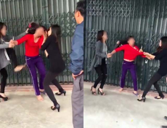 Người phụ nữ bị h&agrave;nh hung, doạ cắt t&oacute;c. Ảnh cắt từ clip