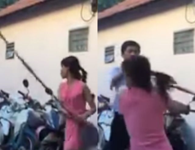 Cầm theo c&aacute;n chổi ngang ngược chửi bới đuổi đ&aacute;nh người vợ. (Ảnh cắt từ clip)
