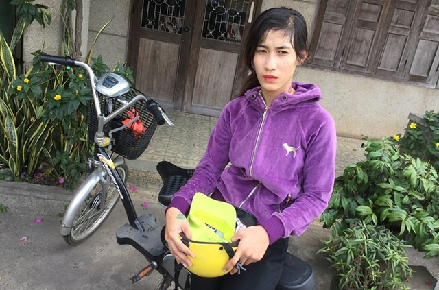 Th&acirc;n Thị Th&ugrave;y Trang tại cơ quan c&ocirc;ng an.