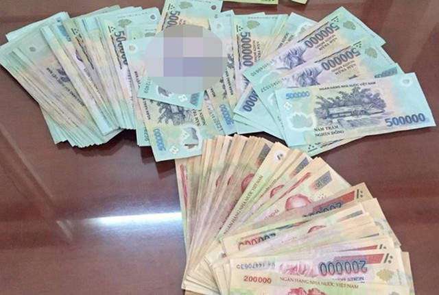 
Tiền của nạn nh&acirc;n bị cướp. Ảnh: C&ocirc;ng an cung cấp.

