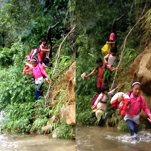Thầy c&ocirc; v&agrave; học sinh đi qua khe n&uacute;i trước khi vượt suối.