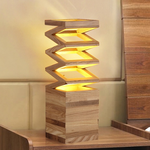 Bạn có thể tậu cho ngôi nhà của mình một mẫu đèn gỗ để bàn đẹp mắt này.