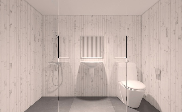 Phòng tắm với tông màu trắng và thiết bị vệ sinh tối giản.