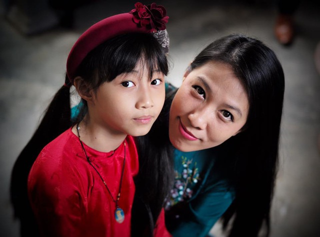 Thùy Trang và cô con gái lớn trong bộ ảnh chụp hồi Tết năm nay.