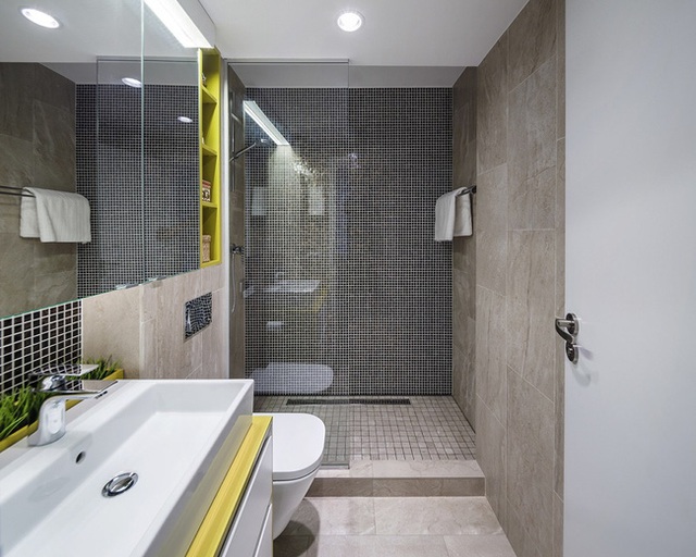 Phòng tắm có thiết kế hiện đại, cách sử dụng chất liệu và màu sắc vô cùng bắt mắt.