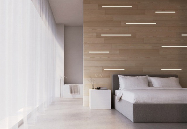 4. Căn phòng ngủ vô cùng thanh lịch với đường nét đơn giản của, vẻ mộc mạc của mảng tường gỗ sáng màu.