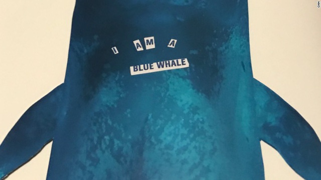 
Dòng nhật ký cùng bức ảnh “Tôi là một con cá voi xanh” được tìm thấy trong vở của Nadia.
