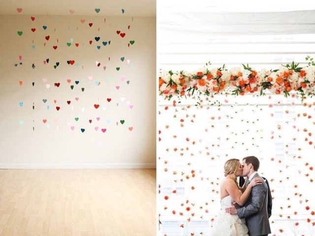 Những nguyên liệu nổi như hoa tươi, hoa giấy hay những tấm bìa hình trái tim, trăng, sao đều có thể được treo lên trên tường để tạo thành một phông nền lãng mạn. Ý tưởng này hoàn toàn phù hợp với bất kỳ phong cách nào.