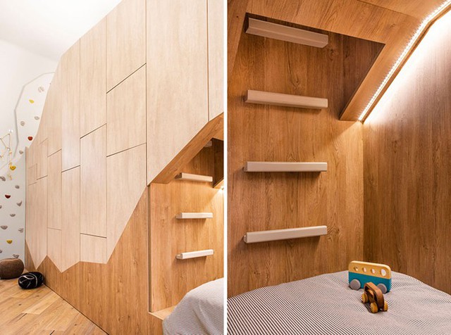 
Các bậc thang gỗ gắn phía cuối giường dẫn lên một chiếc giường khác ở tầng hai.
