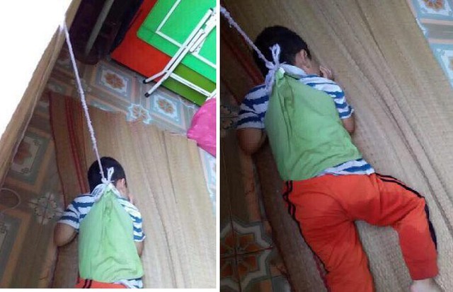 
Hình ảnh cháu bé 4 tuổi bị buộc dây vào người ở trường mầm non B Trực Đại (Nam Định). Ảnh: TL
