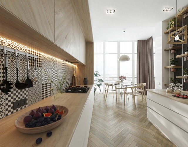 
Căn phòng bếp ấm cúng của gia đình với việc sử dụng chất liệu gỗ tự nhiên cho hầu hết các món đồ nội thất.
