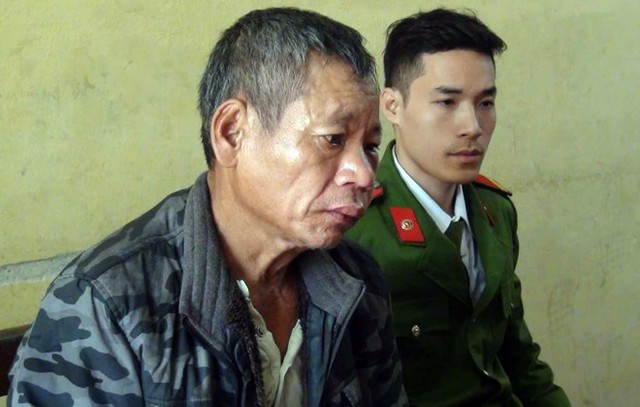 
Vi Văn Đạt tại cơ quan công an. Ảnh: N.H.
