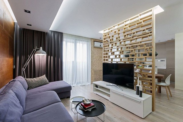 Chất liệu gỗ trong phòng khách không nhất thiết lúc nào cũng phải giới hạn ở trên tường.