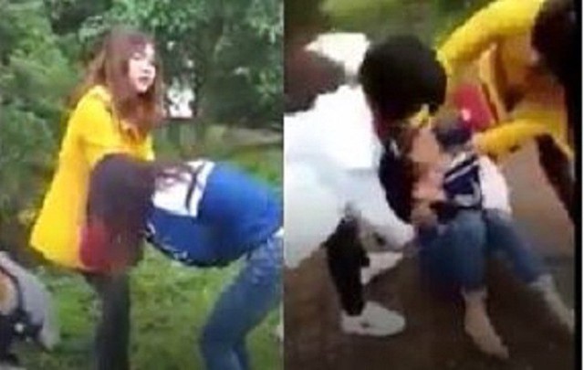 
Nữ sinh bị hai thiếu nữ đánh đập, lột đồ giữa ban ngày. ẢNH: Cắt từ clip
