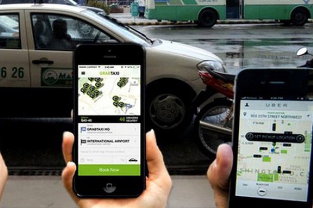 Bộ Công Thương công bố kết quả điều tra vụ Grab mua lại Uber. Ảnh TL