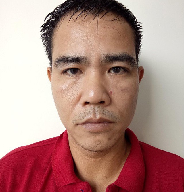 Lê Minh Tuấn tại cơ quan điều tra. Ảnh: N.T.