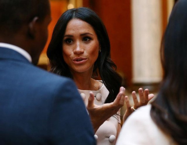 Sức hút của công nương Meghan Markle toát lên từ sự tự tin.